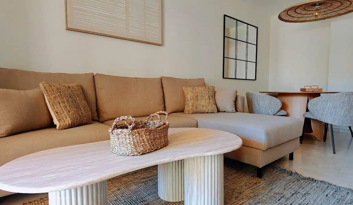 Living room with beige corner sofa – apartment for rent, Terrazas de Costalita, Estepona (ref. AL037)